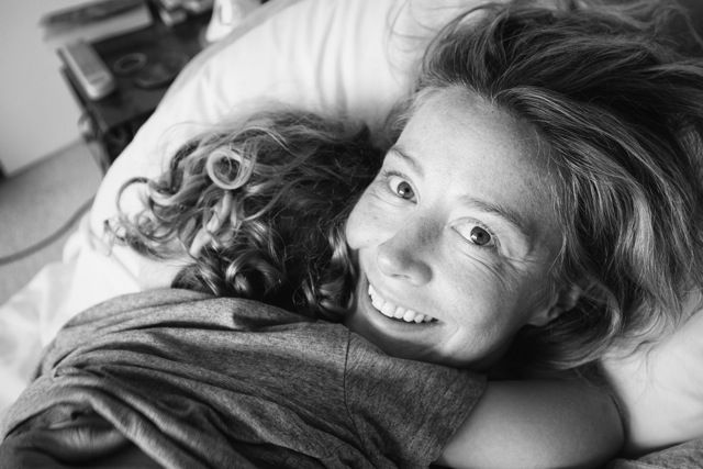 A mother hugging his little son at the bed of the Yoga Nidra massage center