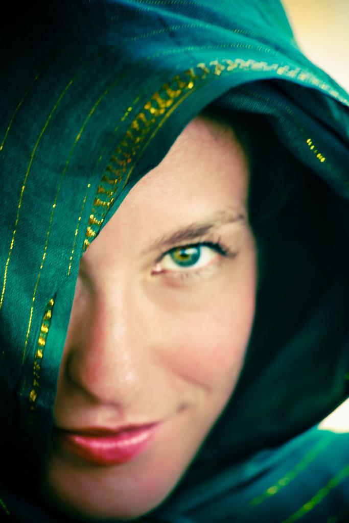 A beautiful little girl wearing a green Dupatta and looking sexy tones Yoga Network